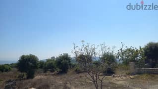 A 4675 m2 land + open mountain/sea view for sale in Batroun