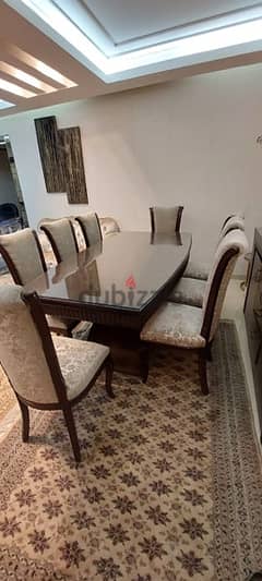 dining room like new with 8 chairs contact only by chat