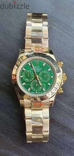 Rolex daytona gold green dial 40 mm