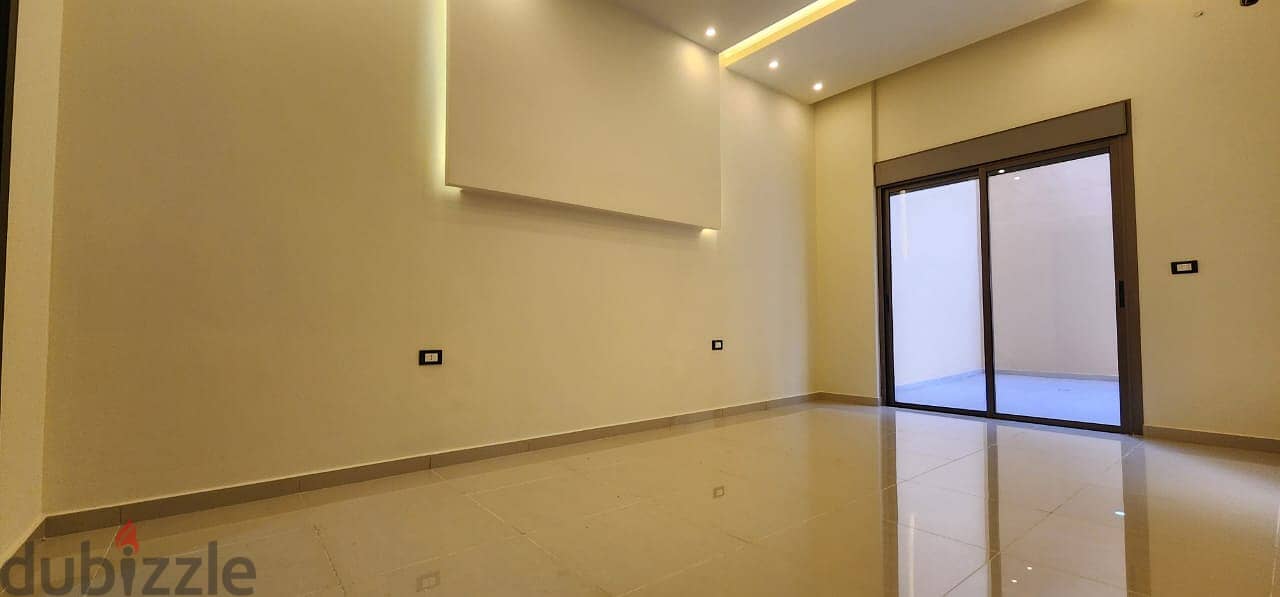L13907-Spacious Apartment With Terrace for Sale In Hazmieh 1