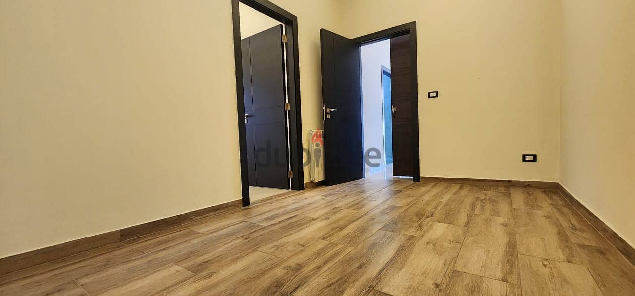 L13907-Spacious Apartment With Terrace for Sale In Hazmieh 2