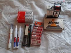 Staples, Tipex, paper clip, and stamp pad & ink 0