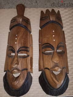 2 African faces. old
