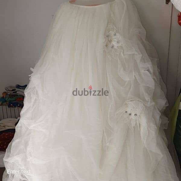 Wedding Dress size Small.  from 50 to 60 kg. 1