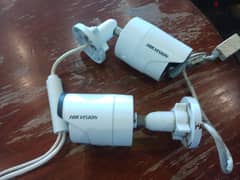 2 x Hikvision Cameras (used but working)