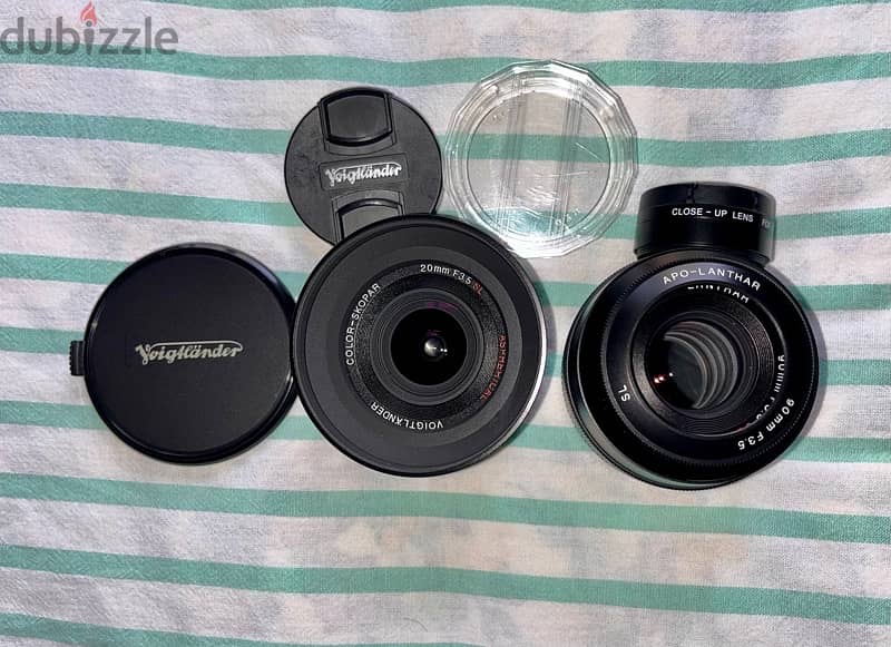 Two Canon EF mount manual focus Voigtlander lenses. 3
