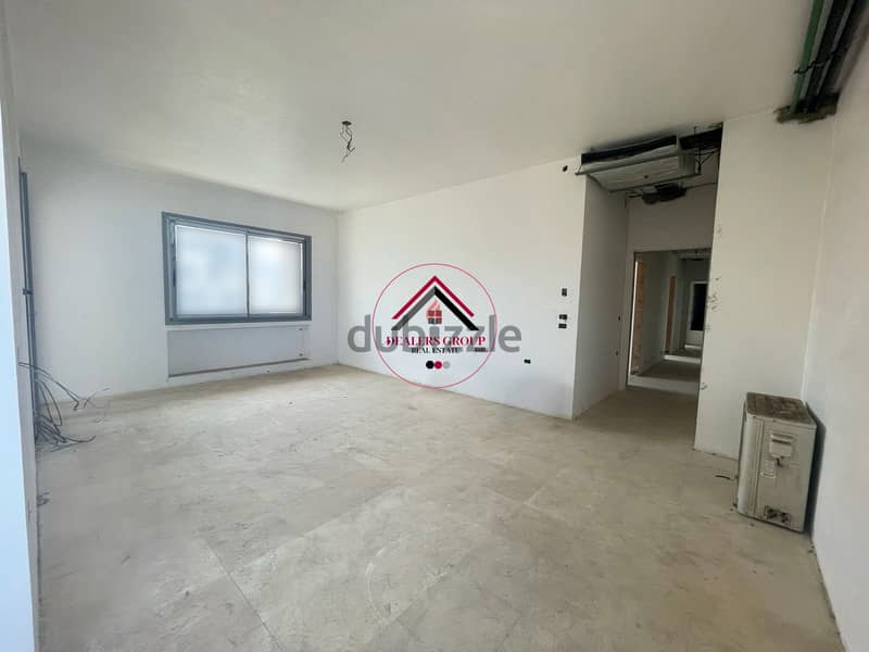 Modern Building ! Core and Shell Apartment for sale in Ramlet el Bayda 4