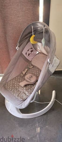 electric baby bouncer + baby bassinet (next to me) + baby bath 2