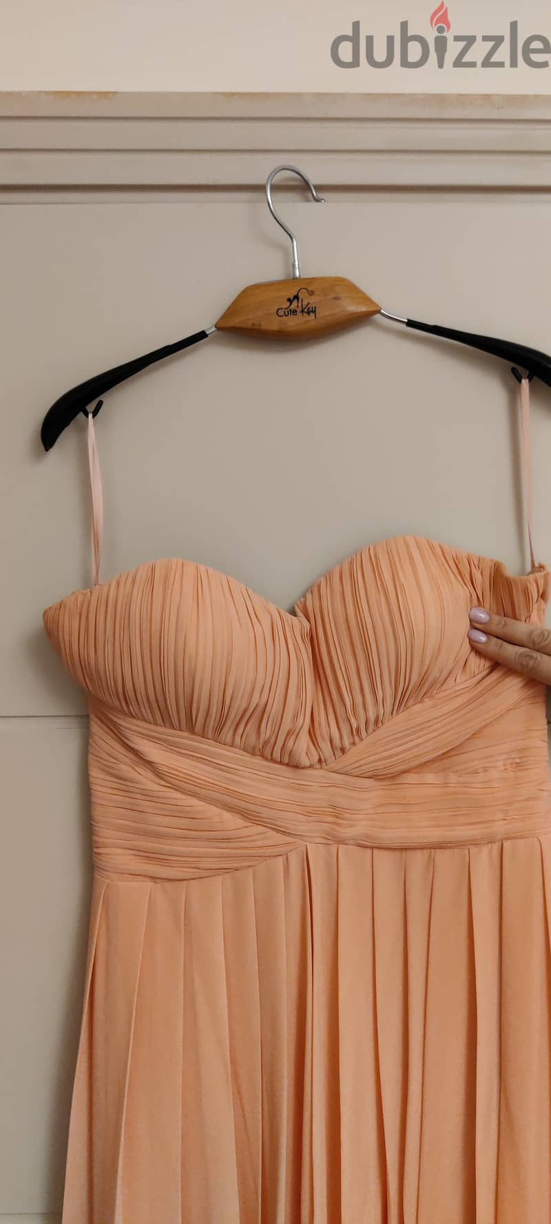 Peach colored dress Strapless silhouette 1