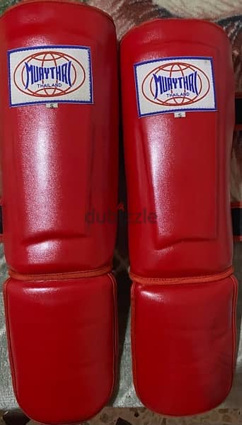 everlast punching bags with gloves and shin guard 1