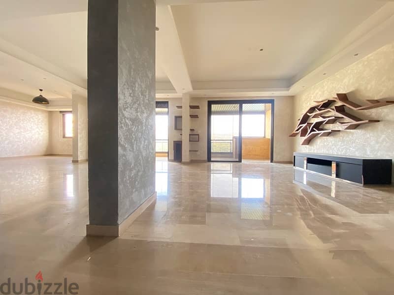 A Spacious apartment for sale in Rabwe with open greenery views. 3