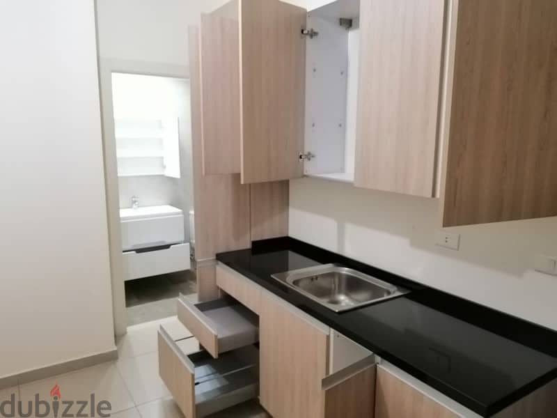 Apartment with Roof and open views for sale in Zouk Mikael. 4