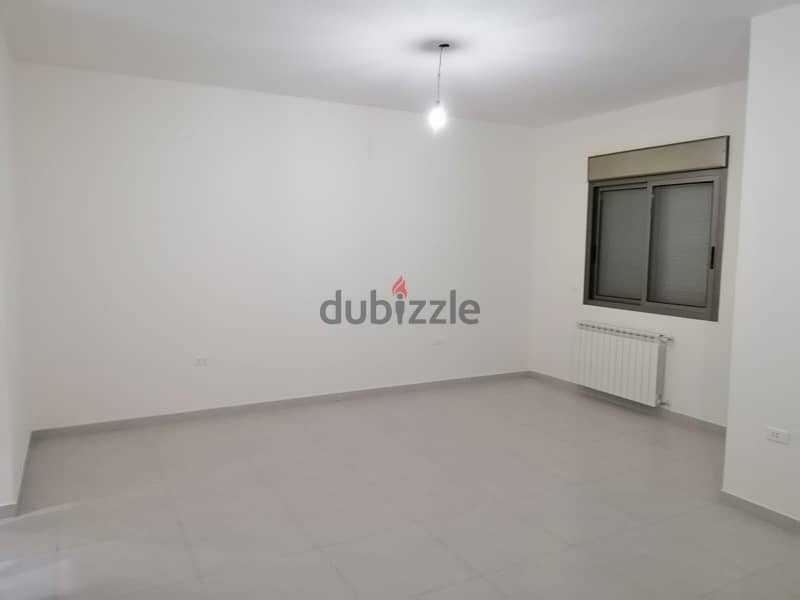 Apartment with Roof and open views for sale in Zouk Mikael. 10