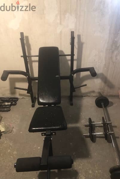 3 in 1 bench + axe + 28kg plates+ pull up bar + elastic bands 1