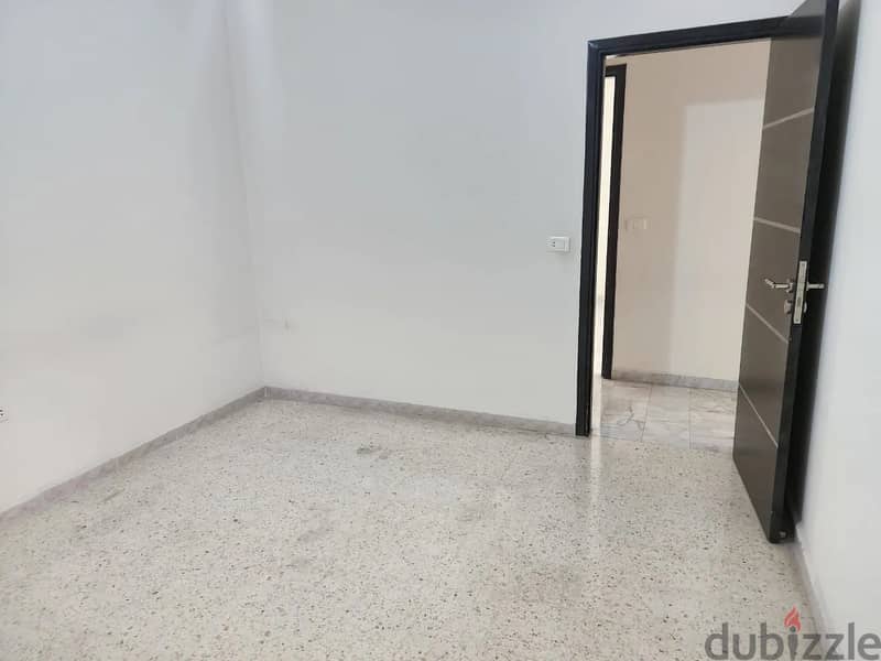 Unfurnished 2-Bedroom Apartment for Rent in New Rawda 4