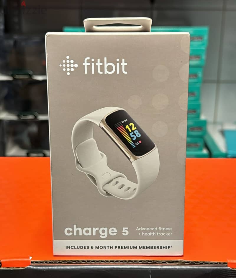 Fitbit Charge 5 soft gold stainless steel case & lunar white band 1