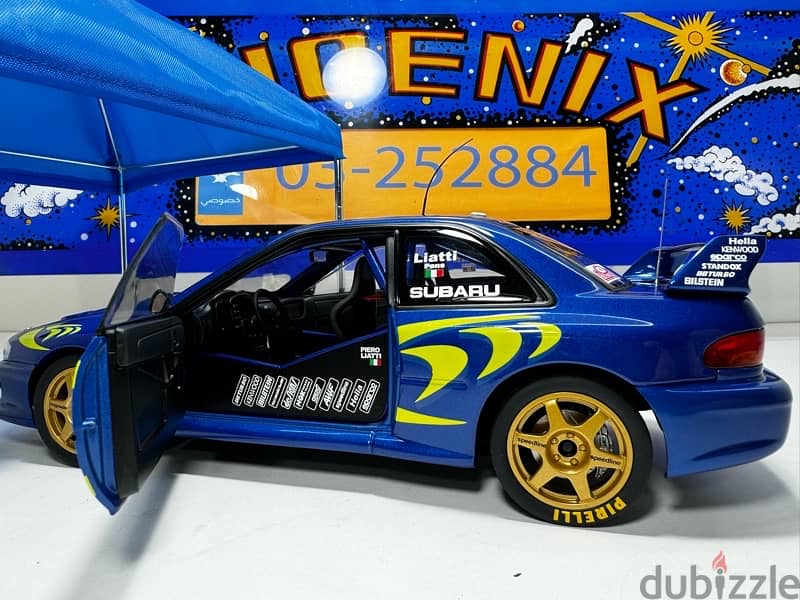 1/18 diecast Autoart Subaru Impreza WRC #4  Monte Carlo Winner 9