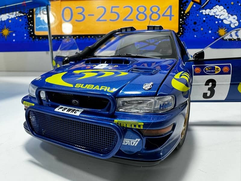1/18 diecast Autoart Subaru Impreza WRC #3 Safari Winner 1997 7