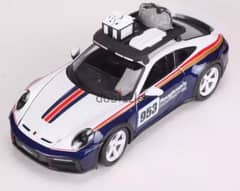 Porsche 911(992) Dakar diecast car model 1:24. 0