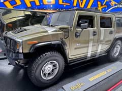 1/18 diecast Hummer H2 Silver by Maisto Thailand (Unused boxed) 0