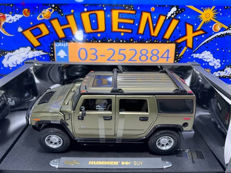 1/18 diecast Hummer H2 Silver by Maisto Thailand (Unused boxed) 3