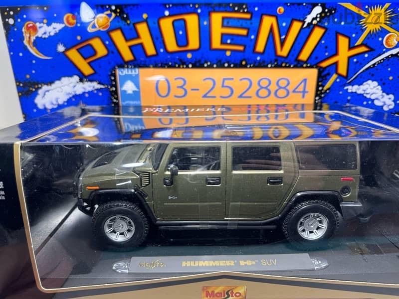 1/18 diecast Hummer H2 Silver by Maisto Thailand (Unused boxed) 4