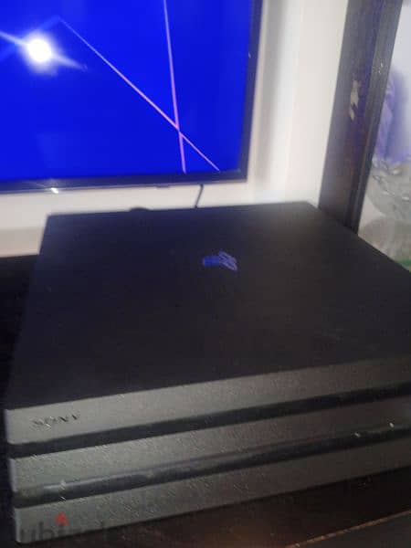 PS4 pro (clean used like new used for 1 year) 0