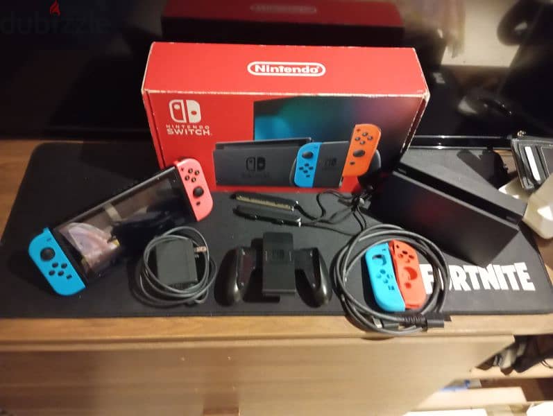 Nintendo switch with accessories and memory card 0