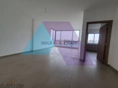 Brand new 120 m2 apartment having partial sea view for sale in Dbaye