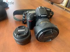 Nikon D7000 + prime lens + wide-angle zoom lens (all used)