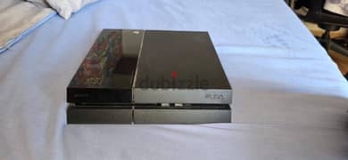 PS4 with two controllers and 15 CDs