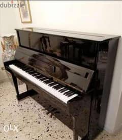 Glossy black piano, from a super-clean company, for excellent quality,