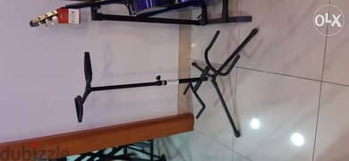 Clasdic and acoustic guitar stand 0