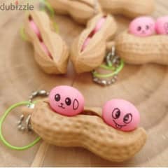 2 in 1 keychain and cute fidget pop out squeeze 3$