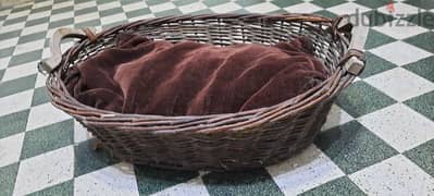 Basket with couch. could be Pet bed
