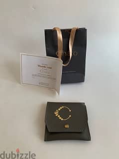 Chato rose gold bracelet with black white and orange zirconium