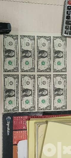 uncut sheet of 8 uncirculated dollar bills 0