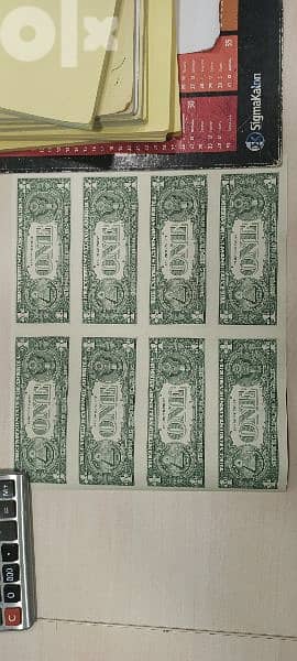 uncut sheet of 8 uncirculated dollar bills 1