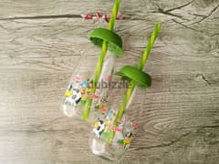 glass milk bottles with straw