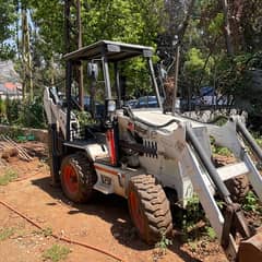 bobcat for sale , excellent condition , complete  blade and plough.